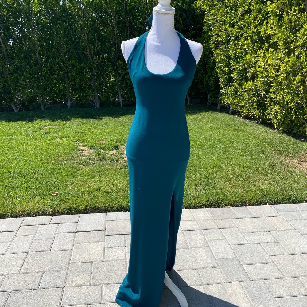 Gorgeous teal Nookie gown with slit at leg. Size medium